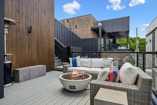 1016B 9th Ave S, Nashville, TN 37203 - deck featuring an outdoor living space with a fire pit and stairs