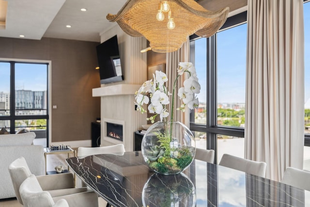 1016B 9th Ave S, Nashville, TN 37203 - dining space with a lit fireplace, healthy amount of natural light, and recessed lighting