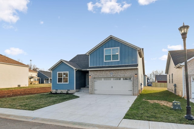 1271 Racker Dr, Clarksville, TN 37043 - view of front of house with board and batten siding, an attached garage, a front yard, concrete driveway, and crawl space