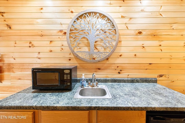 1815 Silver Poplar Ln, Sevierville, TN 37876 - kitchen view of a sink, black microwave, and dark countertops