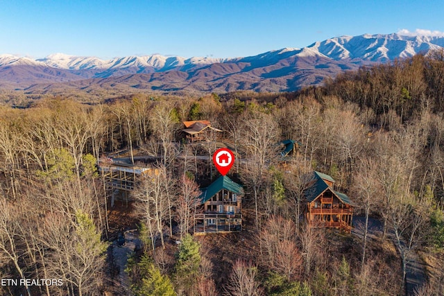 1815 Silver Poplar Ln, Sevierville, TN 37876 - aerial view of property and surrounding area with a mountainous background and a forest