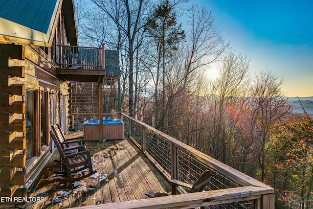 1815 Silver Poplar Ln, Sevierville, TN 37876 - deck at dusk with a hot tub