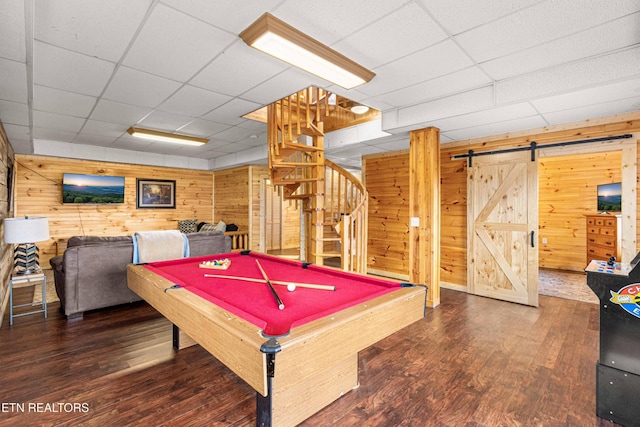 1815 Silver Poplar Ln, Sevierville, TN 37876 - playroom featuring a drop ceiling, wood finished floors, wood walls, pool table, and a barn door