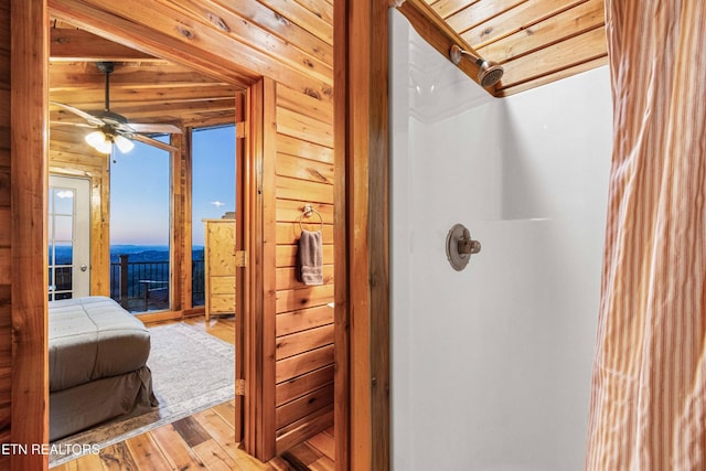 1815 Silver Poplar Ln, Sevierville, TN 37876 - full bathroom with hardwood / wood-style floors, a shower, and a ceiling fan