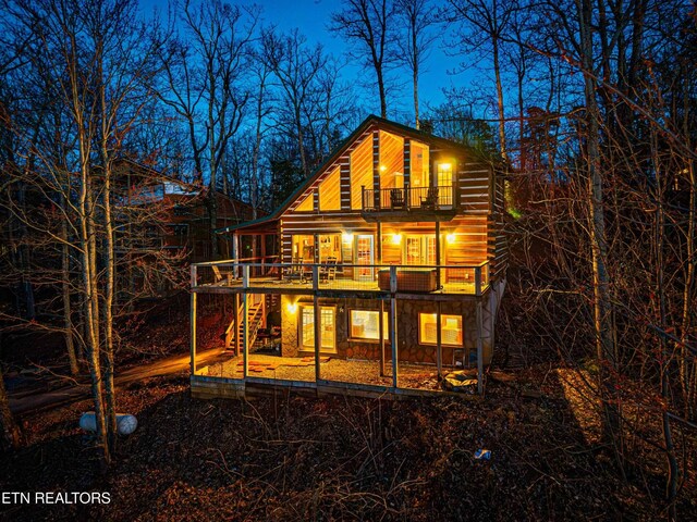 1815 Silver Poplar Ln, Sevierville, TN 37876 - rear view of house featuring a balcony, stairs, and a wooden deck
