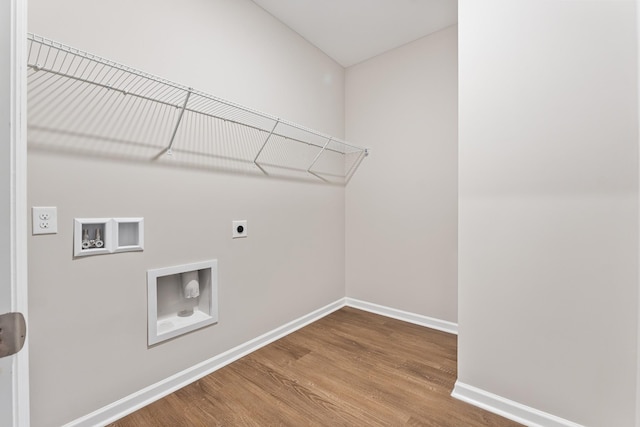 34 Aurora Cir, Fayetteville, TN 37334 - washroom featuring hookup for an electric dryer, wood finished floors, baseboards, and washer hookup
