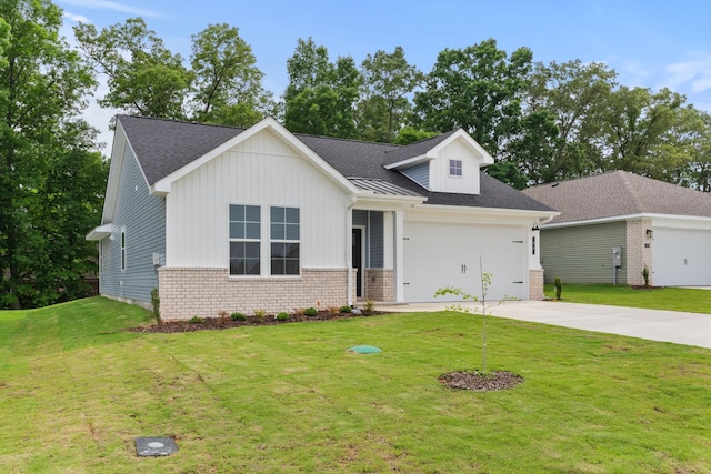 34 Aurora Cir, Fayetteville, TN 37334 - view of front facade featuring board and batten siding, driveway, an attached garage, and a front lawn