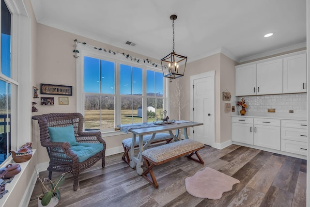 163 Autumn Wind Dr SW, Cleveland, TN 37311 - dining room featuring a chandelier, dark wood-style flooring, ornamental molding, and recessed lighting