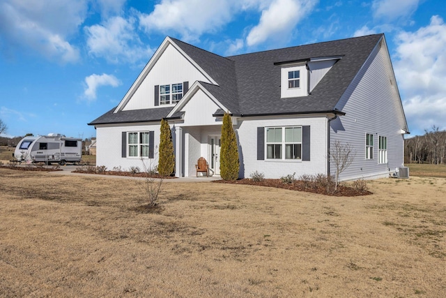 163 Autumn Wind Dr SW, Cleveland, TN 37311 - view of front facade with brick siding, a shingled roof, and a front yard