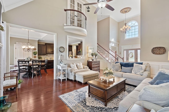 4118 Pretoria Run, Murfreesboro, TN 37128 - living room featuring a chandelier, ornamental molding, a towering ceiling, stairway, and a ceiling fan