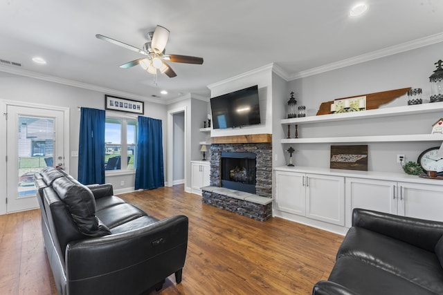 4115 Andes Dr, Murfreesboro, TN 37127 - living area featuring wood finished floors, ornamental molding, a ceiling fan, recessed lighting, and a fireplace