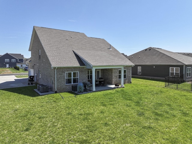 4115 Andes Dr, Murfreesboro, TN 37127 - back of property featuring a patio, central AC, brick siding, and roof with shingles