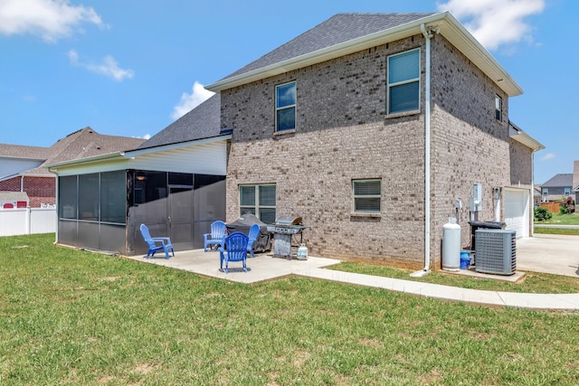 1114 Escalade Ct, Lascassas, TN 37085 - rear view of house featuring a sunroom, central air condition unit, a patio, a lawn, and brick siding