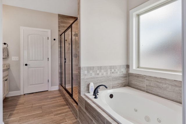 1114 Escalade Ct, Lascassas, TN 37085 - full bathroom with a tub with jets, a stall shower, vanity, and plenty of natural light
