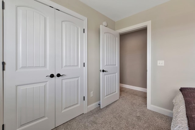 1114 Escalade Ct, Lascassas, TN 37085 - unfurnished bedroom featuring light colored carpet, a closet, and baseboards