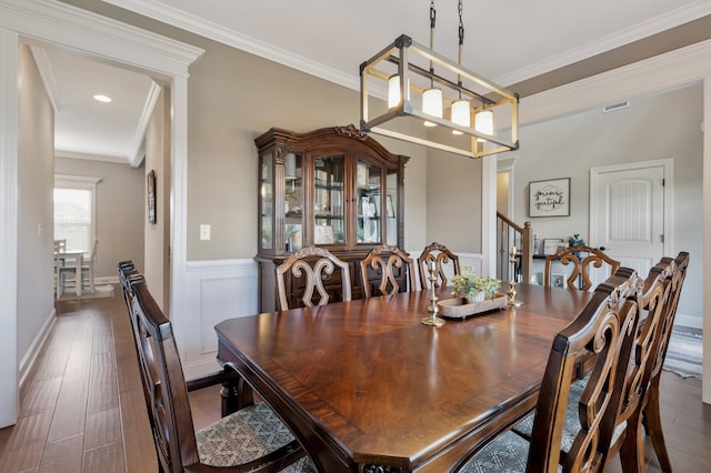 1114 Escalade Ct, Lascassas, TN 37085 - dining area featuring wainscoting, ornamental molding, dark wood-style flooring, and stairs