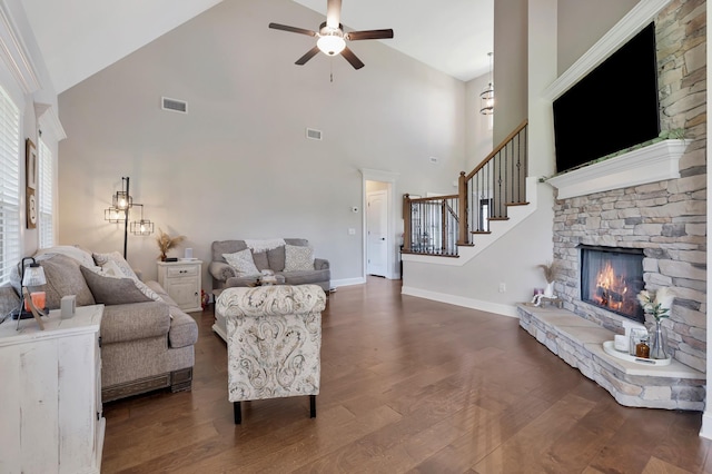 1114 Escalade Ct, Lascassas, TN 37085 - living room with high vaulted ceiling, ceiling fan, wood finished floors, baseboards, and a stone fireplace