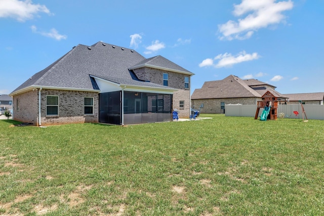1114 Escalade Ct, Lascassas, TN 37085 - rear view of property featuring a sunroom, a playground, and brick siding