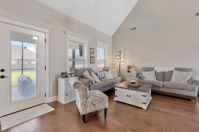 1114 Escalade Ct, Lascassas, TN 37085 - living room featuring dark wood-style flooring, high vaulted ceiling, and baseboards