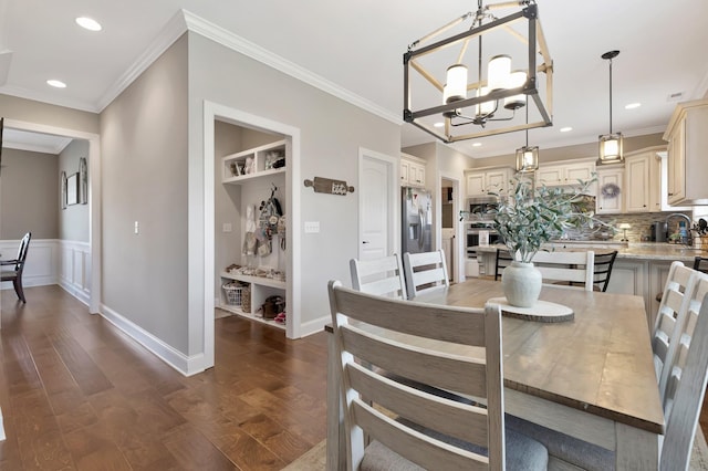 1114 Escalade Ct, Lascassas, TN 37085 - dining space with dark wood-style floors, a chandelier, ornamental molding, recessed lighting, and baseboards