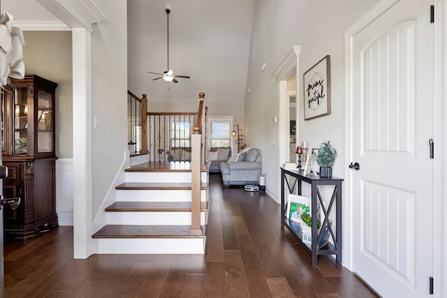 1114 Escalade Ct, Lascassas, TN 37085 - stairs featuring a ceiling fan, wood-type flooring, a towering ceiling, and baseboards