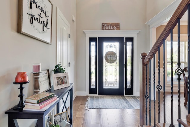 1114 Escalade Ct, Lascassas, TN 37085 - entryway with wood finished floors, stairway, baseboards, and a towering ceiling