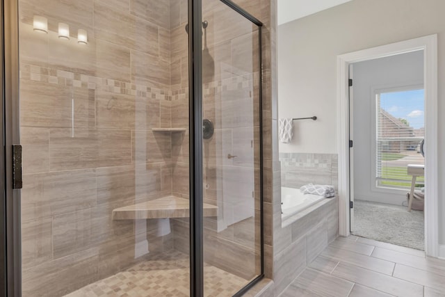 1114 Escalade Ct, Lascassas, TN 37085 - bathroom featuring a bath, a shower stall, and tile patterned flooring