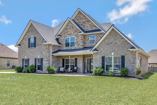 1114 Escalade Ct, Lascassas, TN 37085 - craftsman inspired home featuring a front yard, brick siding, and cooling unit