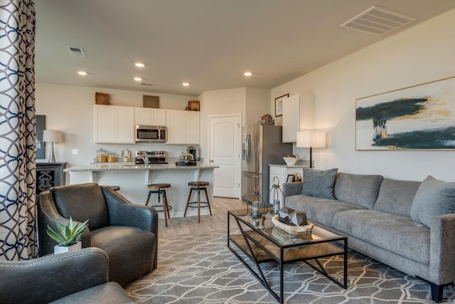 4922 Mowbray Way, Murfreesboro, TN 37129 - living area featuring light wood-type flooring and recessed lighting