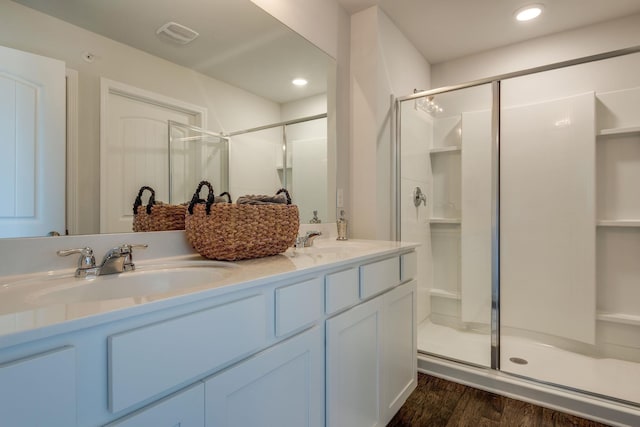 4922 Mowbray Way, Murfreesboro, TN 37129 - bathroom featuring a stall shower, wood finished floors, double vanity, and recessed lighting
