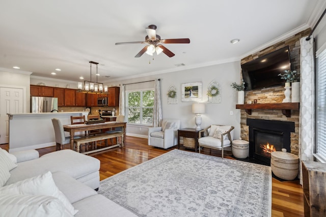 3324 Redmon Hl, Nolensville, TN 37135 - living area featuring wood finished floors, ceiling fan, a fireplace, ornamental molding, and baseboards