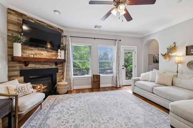 3324 Redmon Hl, Nolensville, TN 37135 - living area with crown molding, wood finished floors, baseboards, a fireplace, and a ceiling fan