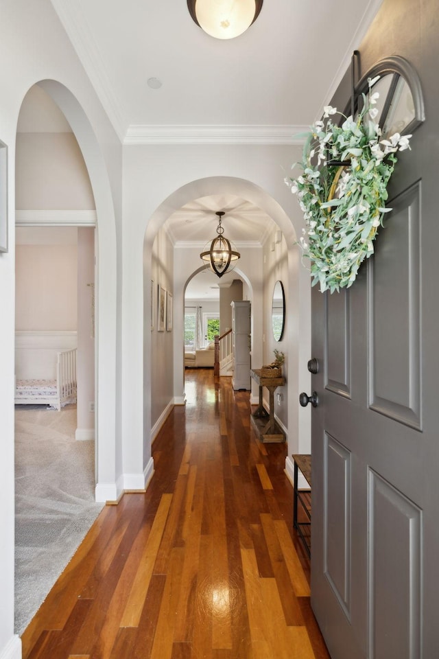 3324 Redmon Hl, Nolensville, TN 37135 - foyer entrance featuring arched walkways, crown molding, wood finished floors, and baseboards
