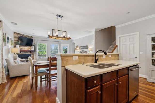 3324 Redmon Hl, Nolensville, TN 37135 - kitchen with open floor plan, a sink, stainless steel dishwasher, crown molding, and a stone fireplace