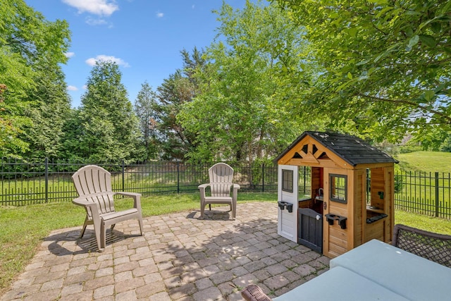 3324 Redmon Hl, Nolensville, TN 37135 - view of patio / terrace featuring an outbuilding and view of wooded area