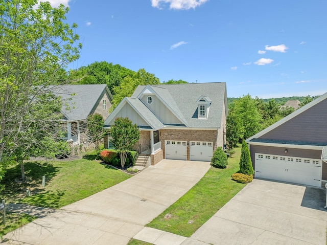 3324 Redmon Hl, Nolensville, TN 37135 - craftsman-style house featuring a garage, driveway, a front yard, board and batten siding, and brick siding