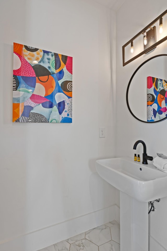 1203B Brick Church Pike, Nashville, TN 37207 - bathroom with marble finish floors, a sink, and baseboards