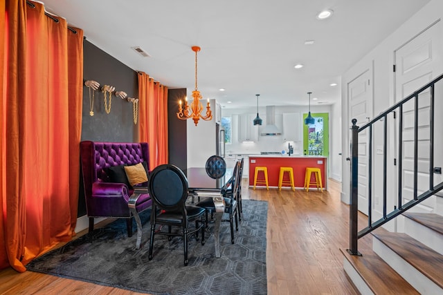 1203B Brick Church Pike, Nashville, TN 37207 - dining room featuring a chandelier, wood finished floors, recessed lighting, and stairs