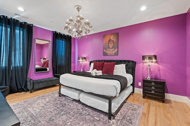 1203B Brick Church Pike, Nashville, TN 37207 - bedroom with a chandelier, wood finished floors, and recessed lighting