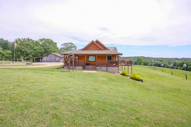 1820 Buck Smith Rd, Palmyra, TN 37142 - rear view of house with a porch and a yard