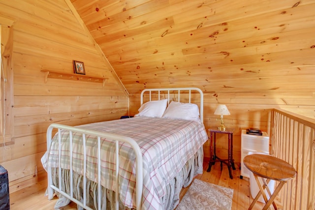 1820 Buck Smith Rd, Palmyra, TN 37142 - bedroom with lofted ceiling, wood-type flooring, wood walls, and wooden ceiling