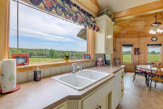 1820 Buck Smith Rd, Palmyra, TN 37142 - kitchen with a sink, plenty of natural light, vaulted ceiling, wood ceiling, and light countertops