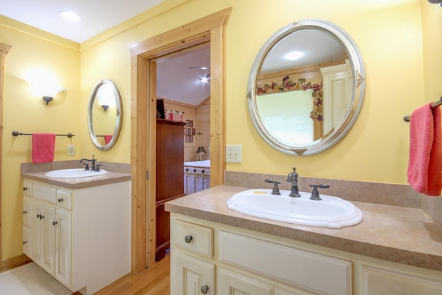 1820 Buck Smith Rd, Palmyra, TN 37142 - full bath with two vanities and wood finished floors