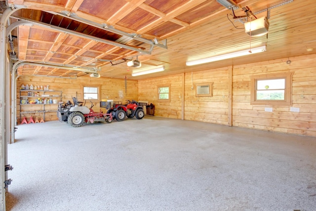 1820 Buck Smith Rd, Palmyra, TN 37142 - garage with a garage door opener, wood walls, and wood ceiling