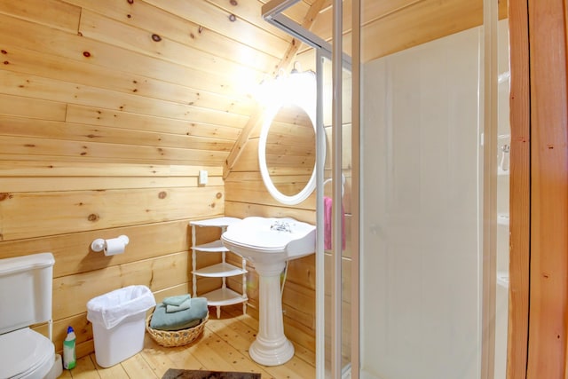 1820 Buck Smith Rd, Palmyra, TN 37142 - full bath with toilet, a shower stall, hardwood / wood-style flooring, and wooden walls