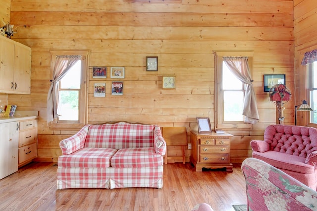 1820 Buck Smith Rd, Palmyra, TN 37142 - bedroom featuring wooden walls and light wood-style floors