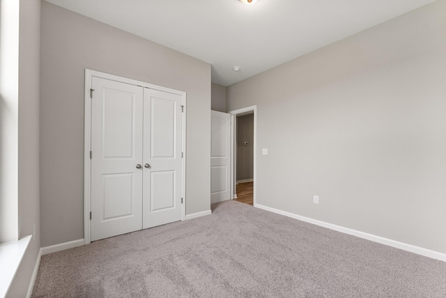 36 Aurora Cir, Fayetteville, TN 37334 - unfurnished bedroom with carpet, baseboards, and a closet
