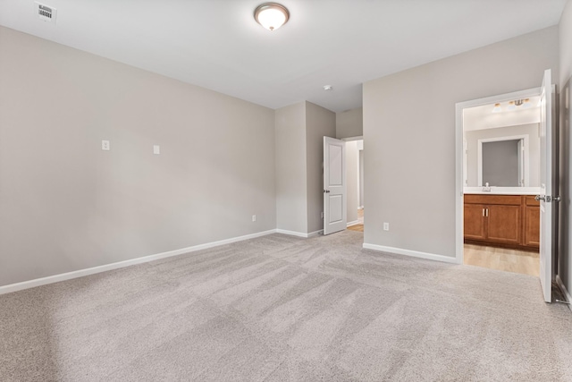 36 Aurora Cir, Fayetteville, TN 37334 - unfurnished bedroom with light carpet, baseboards, ensuite bath, and a sink