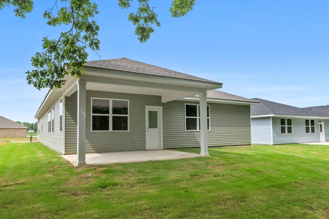 36 Aurora Cir, Fayetteville, TN 37334 - rear view of property featuring a patio area, a yard, and a shingled roof