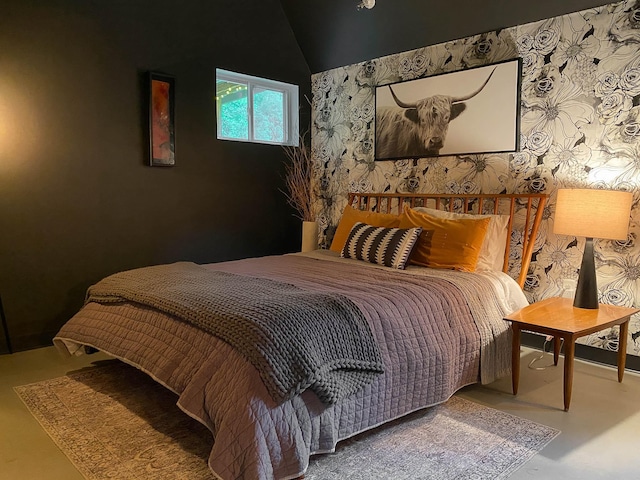 6969 Cuba Landing Rd, Waverly, TN 37185 - bedroom with finished concrete flooring and lofted ceiling